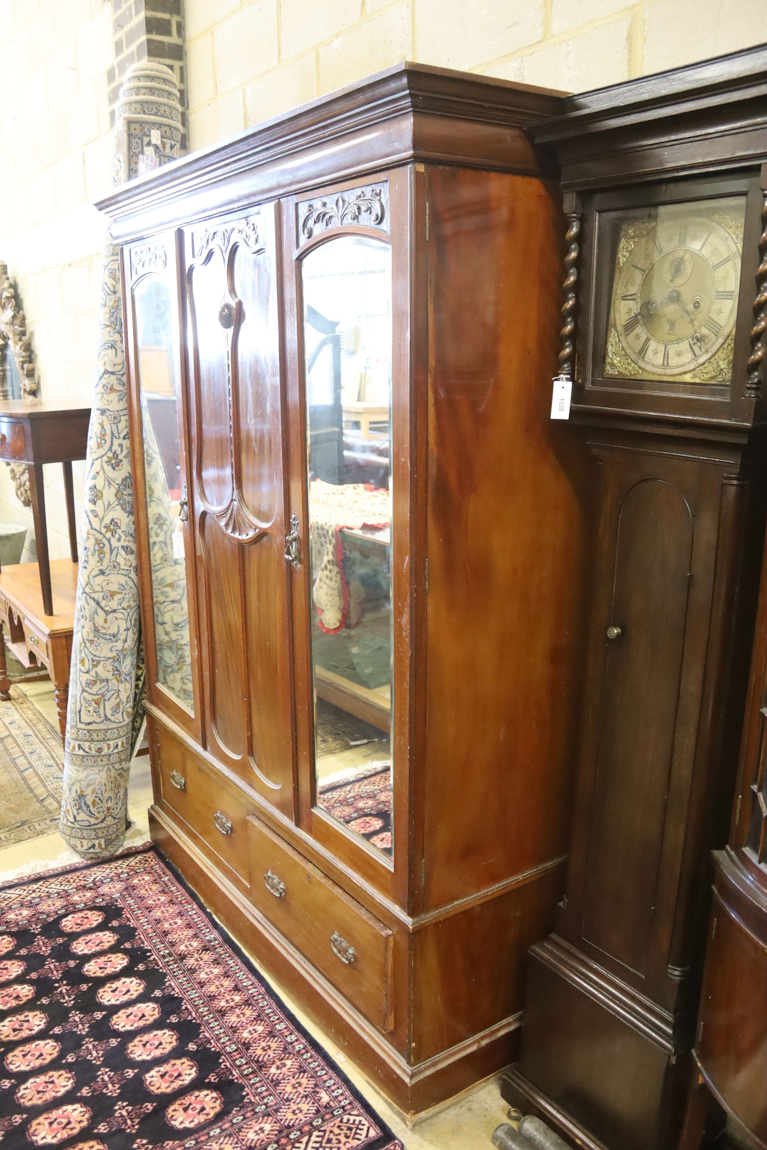 A late Victorian mahogany mirrored wardrobe, length 160cm, depth 54cm, height 210cm